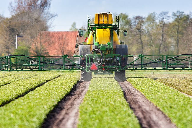 Mantel Verwacht het Materialisme Agami - Tractor die landbouwgif spuit, Tractor spraying pesticides