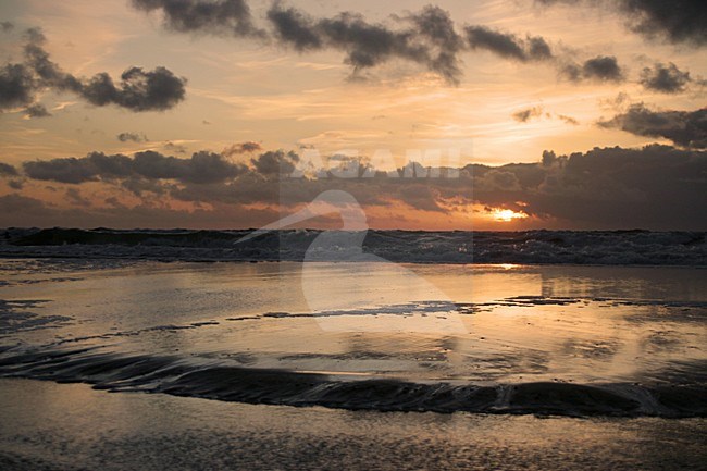 Sunset at the beach of Katwijk Netherlands; Zonsondergang aan het strand van Katwijk Nederland stock-image by Agami/Bas Haasnoot,