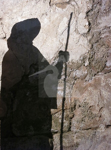 Shadow of Saint James statue in ancient medieval town of Conques in southern France. stock-image by Agami/Marc Guyt,