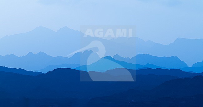 Hadschar-Mountains cast in in blue colour, Oman stock-image by Agami/Ralph Martin,