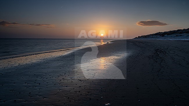 Sunrise on the beach at Cape North on the Wadden Island of Texel in winter. Netherlands stock-image by Agami/Onno Wildschut,