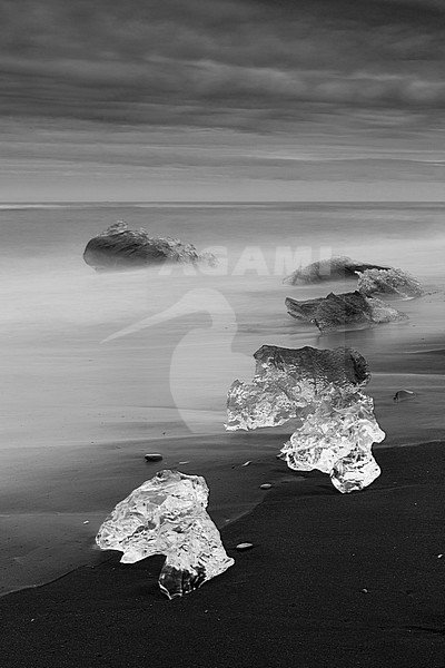Diamond Beach, pieces of ice   on the beach with icebergs in the background stock-image by Agami/Saverio Gatto,