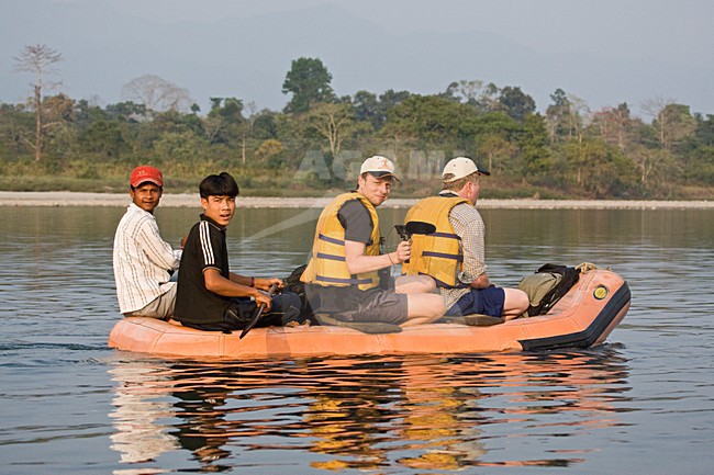 Vogelaars in bootje in Assam; Birdwatchers in boat in Assam, India stock-image by Agami/Marc Guyt,