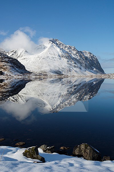 Mountains reflected into the calm water of a lake. Eggum, Lofoten Islands, Nordland, Norway. stock-image by Agami/Sergio Pitamitz,
