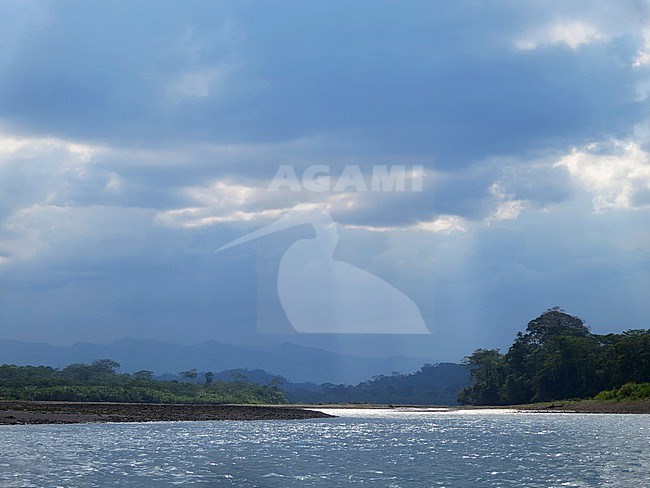 Dark rain clouds over the Alto Madre de Dios River in the Lower Amazon rainforest in Madre de Dios department in Peru. stock-image by Agami/Marc Guyt,