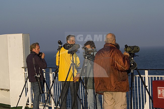 Birders on deck of the Pride of Bilbao; Vogelaars op het dek van de Pride of Bilbao stock-image by Agami/Marc Guyt,