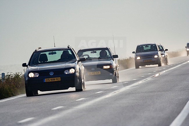 Auto's rijdend op Oostvaardersdijk, Cars driving at Oostvaardersdijk stock-image by Agami/Marc Guyt,