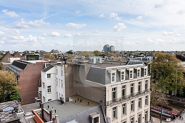 Uitzicht over de daken in Amsterdam; View over rooftops in Amsterdam stock-image by Agami/Marc Guyt,