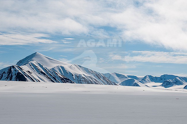 Snow streaked mountains on the island of Spitsbergen. Near Mushamna, Spitsbergen Island, Svalbard, Norway. stock-image by Agami/Sergio Pitamitz,