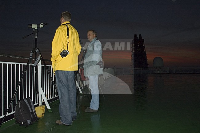 Birders on deck of the Pride of Bilbao; Vogelaars op het dek van de Pride of Bilbao stock-image by Agami/Marc Guyt,