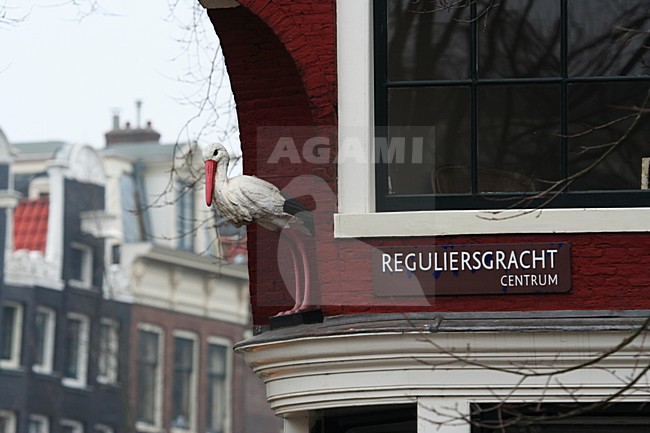 Statue of White Stork in Amsterdam; Gevelbeeld Ooievaar in Amsterdam stock-image by Agami/Marc Guyt,