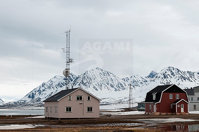 Colorful buildings near mountains and arctic waters at the research station, Ny-Alesund. Ny-Alesund, Kongsfjorden, Spitsbergen Island, Svalbard, Norway. stock-image by Agami/Sergio Pitamitz,