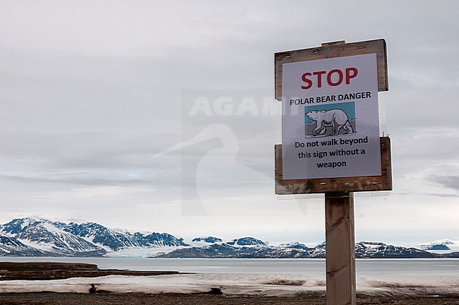 A danger sign warning of polar bears at the research station of Ny-Alesund. Ny-Alesund, Kongsfjorden, Spitsbergen Island, Svalbard, Norway. stock-image by Agami/Sergio Pitamitz,