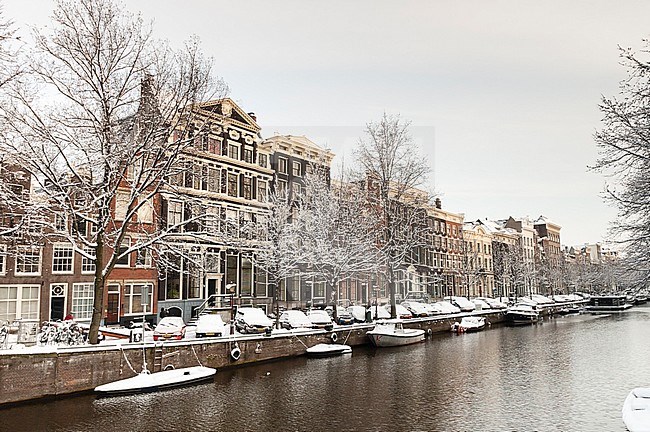 Stadsbeeld van een besneeuwd Amsterdam; Cityscape of snow-covered Amsterdam stock-image by Agami/Marc Guyt,